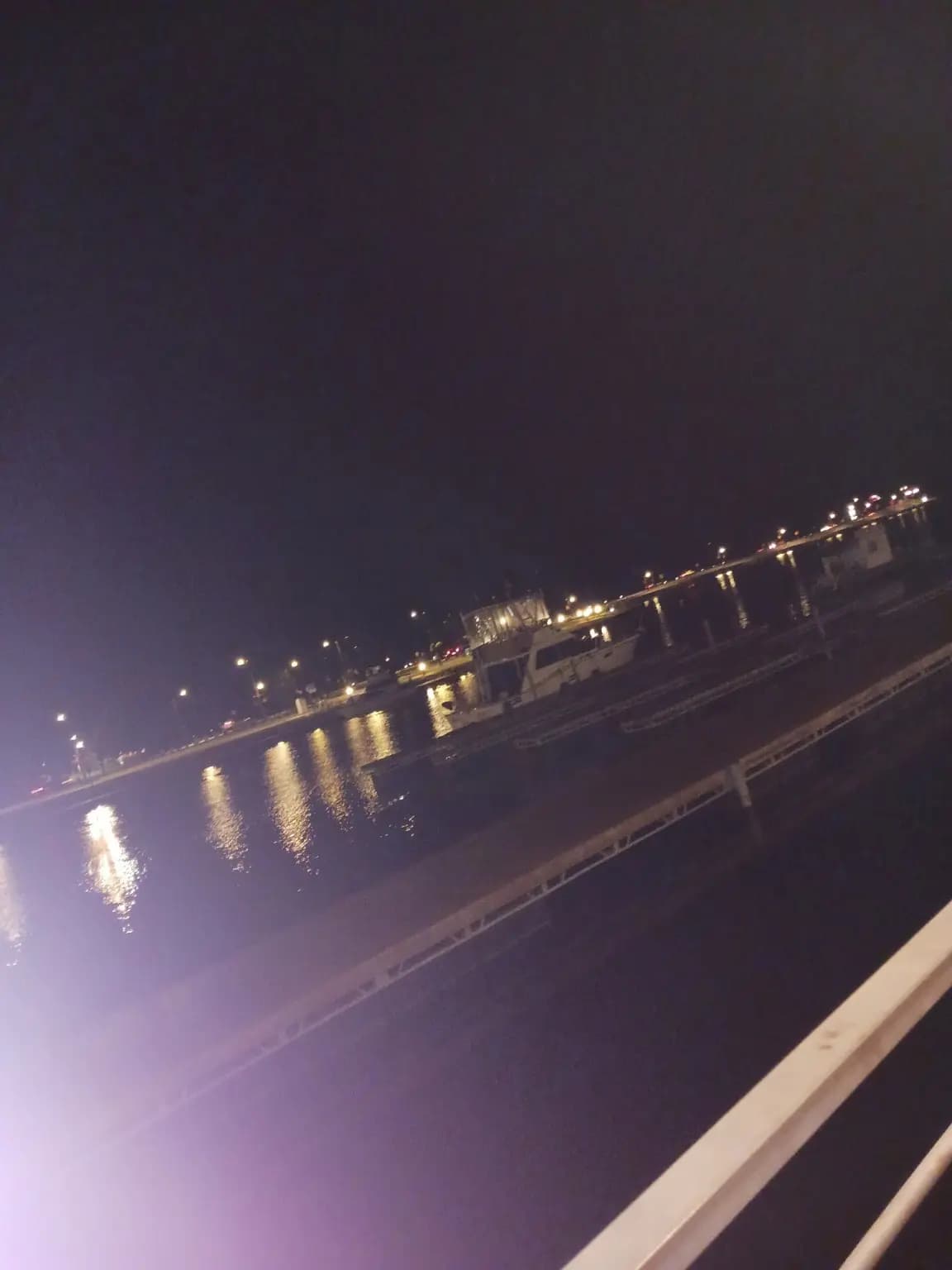 City Harbor reflected on the water after dark