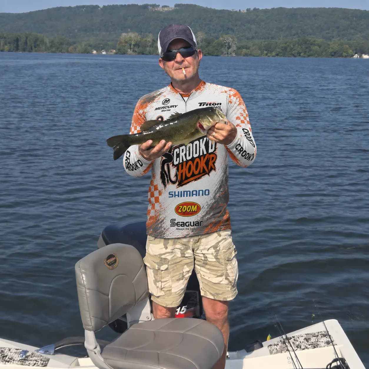 Mushy holding the four-pound largemouth, the biggest fish of the trip